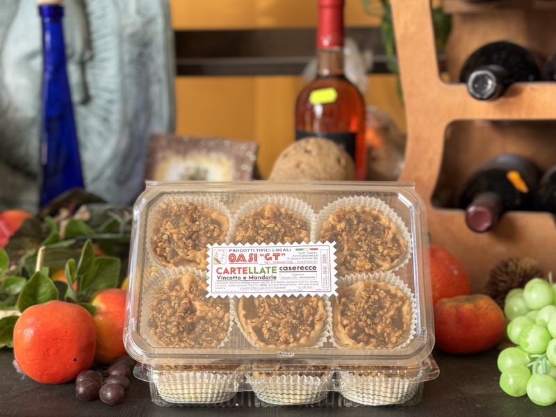 Homemade cartellate with almonds and vincotto